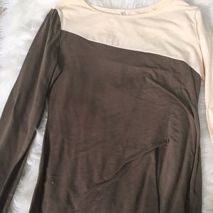 Green and Cream colored long sleeve shirt.